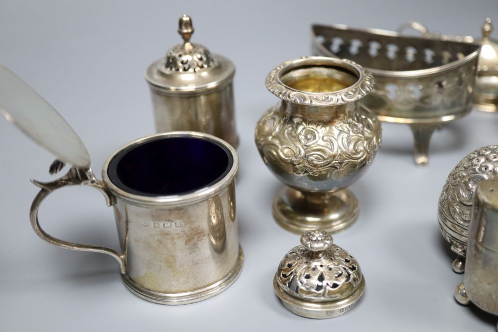 A collection of silver condiments, including a William IV foliate-embossed pepper approx 21.25oz